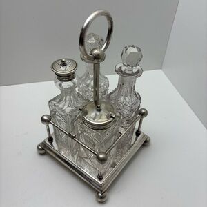 Antique Barker Bros mix and match silver plated and cut glass cruet set